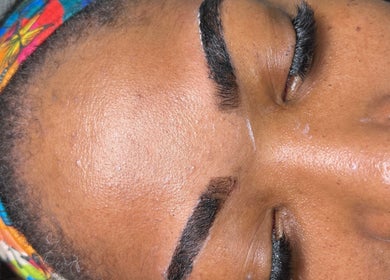 Eyebrow styling at Obsessed Beauty Bar in Bedford, Ohio, US showcasing expert design.