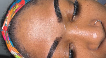 Eyebrow styling at Obsessed Beauty Bar in Bedford, Ohio, US showcasing expert design.