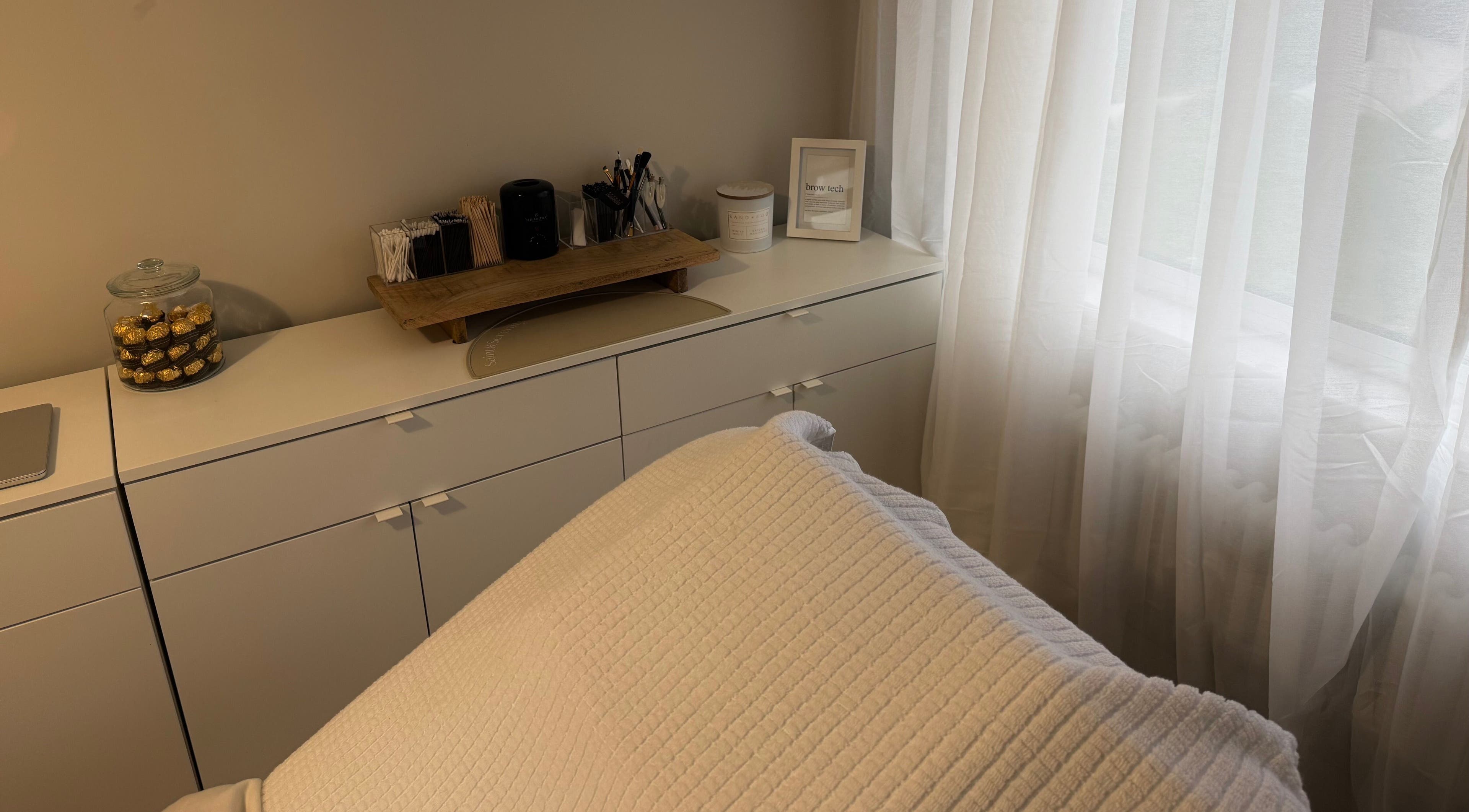 Ultra-modern, serene treatment room at Skulpted by Harriet, Bognor Regis, England, GB, showcasing tranquility.