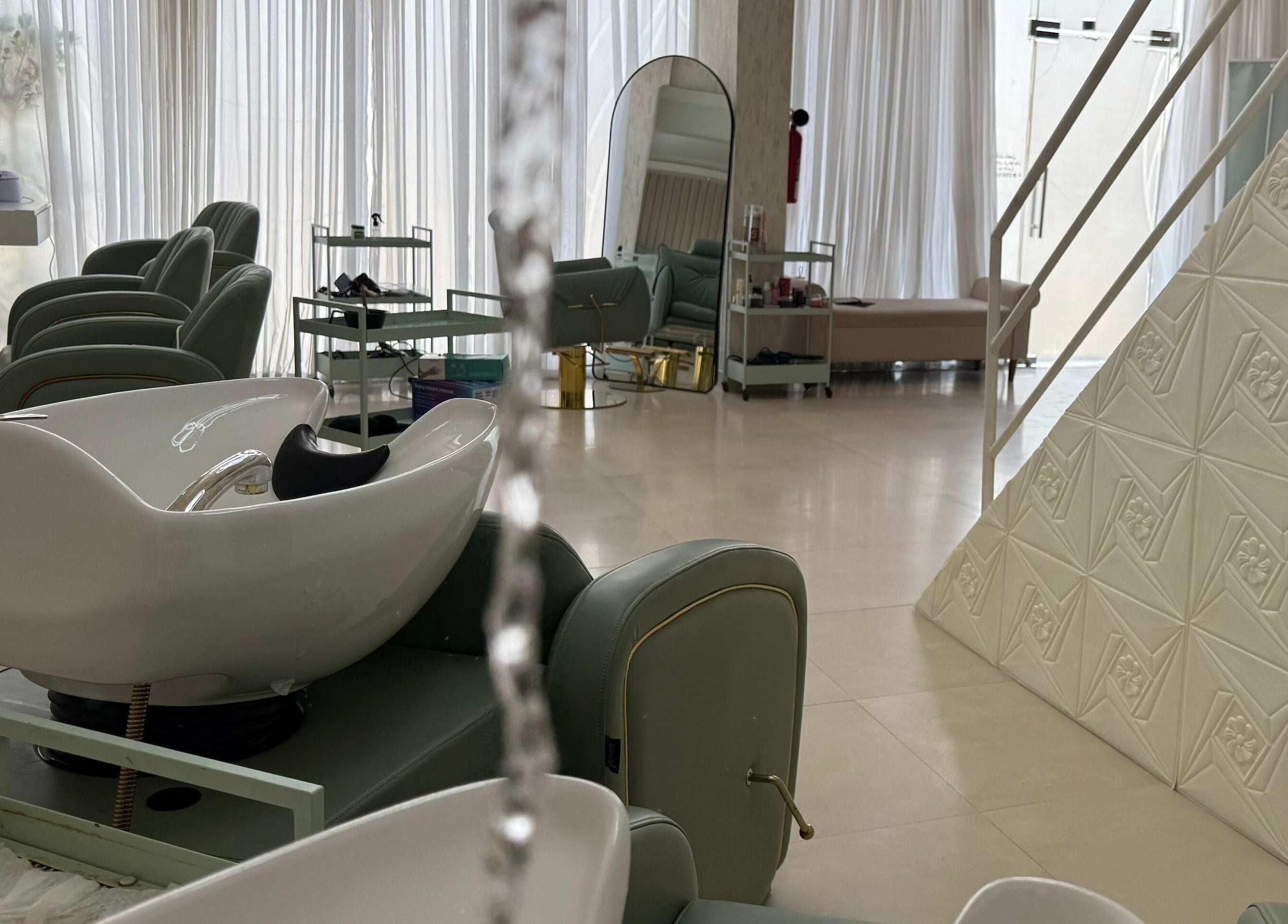 Modern interior of H Beauty Ladies Salon in Ajman, Ajman, AE, featuring elegant salon chairs and decor.