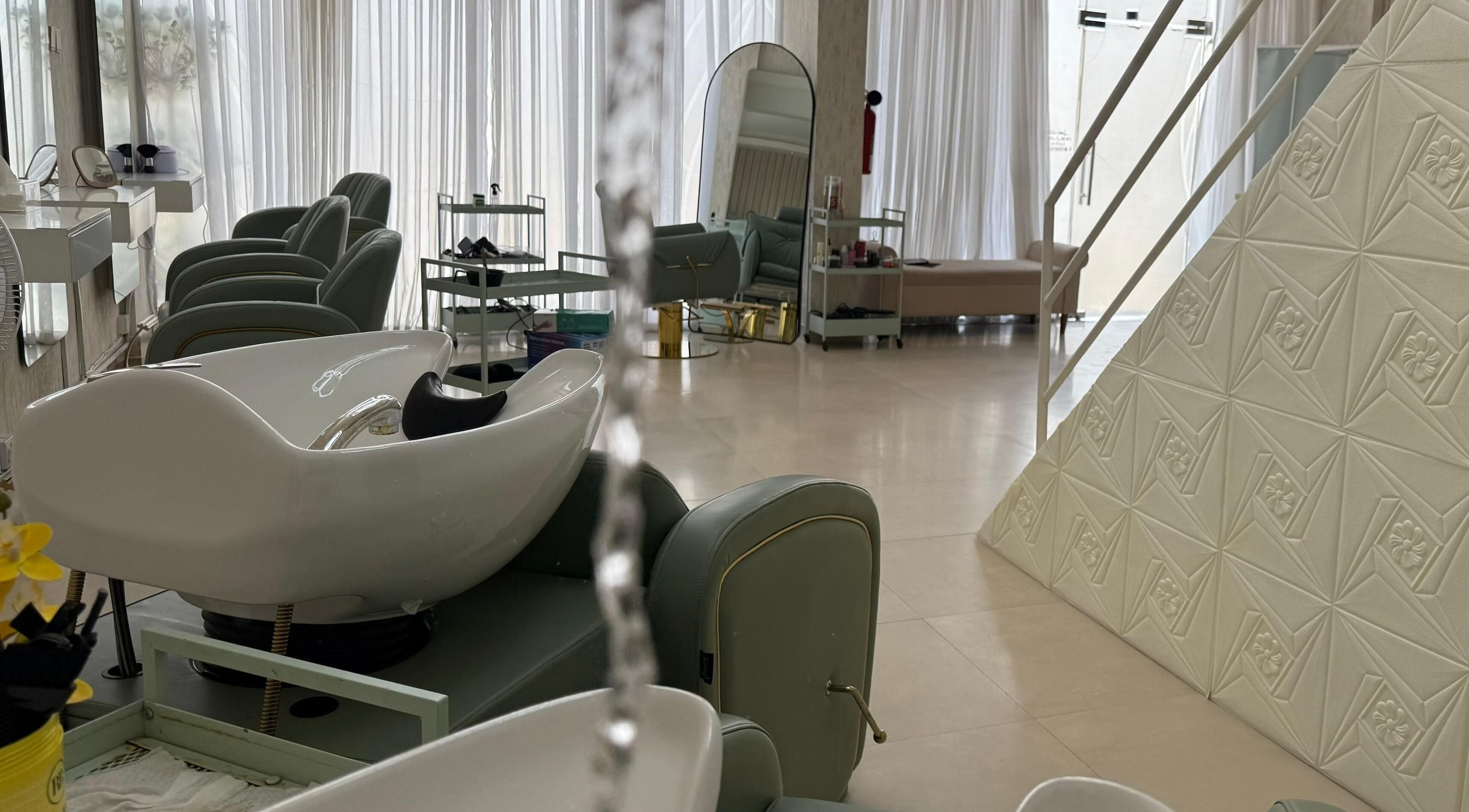 Modern interior of H Beauty Ladies Salon in Ajman, Ajman, AE, featuring elegant salon chairs and decor.