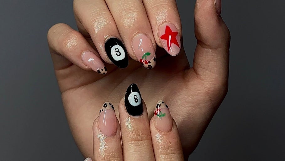 Stylish nail art featuring bold designs at Nails by Mia, La Grande, Oregon, US.