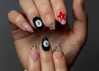 Stylish nail art featuring bold designs at Nails by Mia, La Grande, Oregon, US.