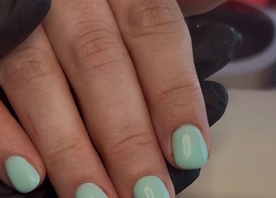 Fresh mint manicure at Niche Nails, Ellesmere Port, England, GB, showcasing smooth elegant nail care.