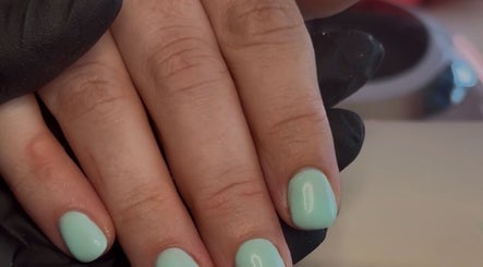 Fresh mint manicure at Niche Nails, Ellesmere Port, England, GB, showcasing smooth elegant nail care.