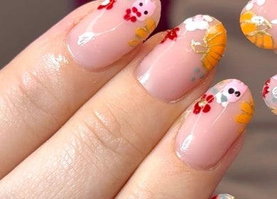 Intricate floral nail art at Niche Nails, Ellesmere Port, England, GB, showcasing detailed design.