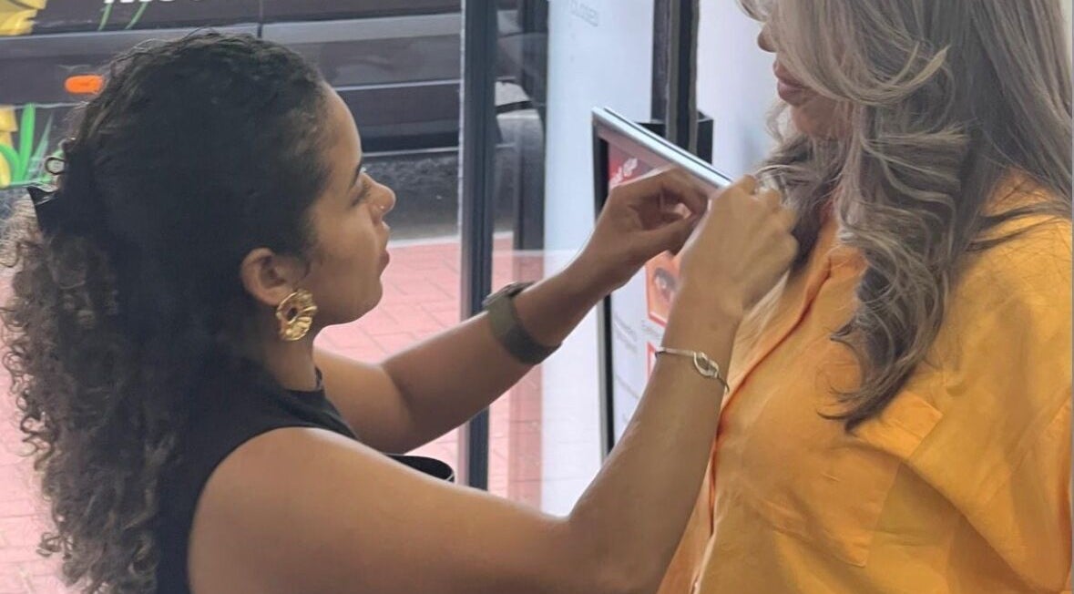 Stylist at Jessi Porphyrio hair in Smethwick, England, GB creating beautiful hairstyle.