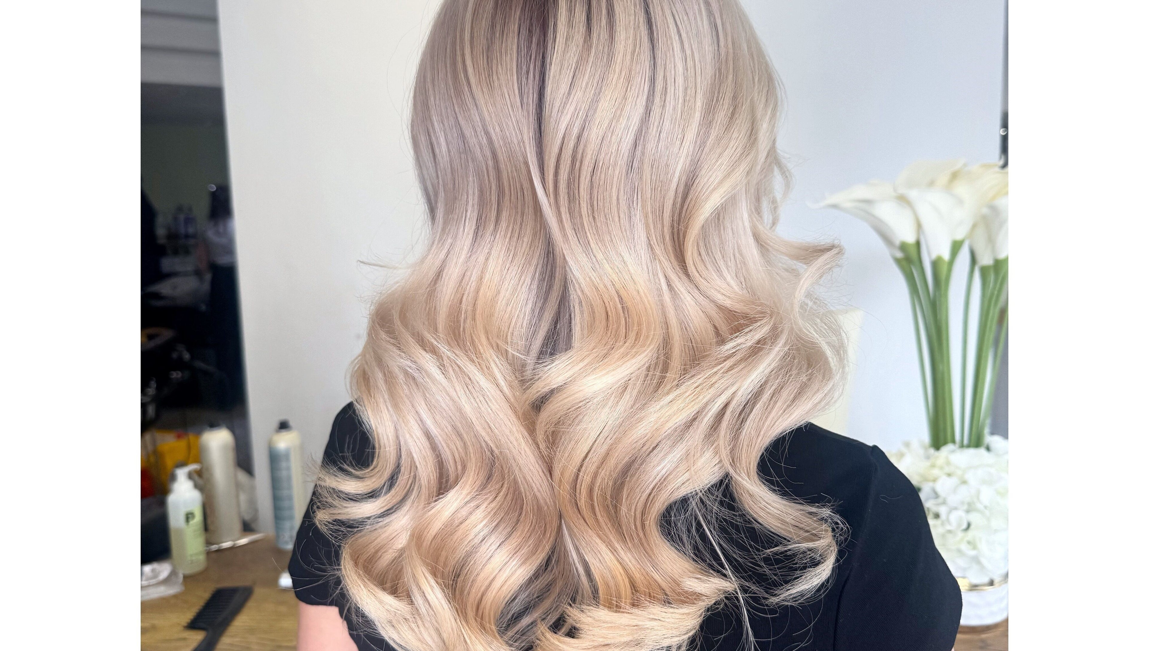 Blonde hair styled in waves at Isabelle Grace Hair, Studio J, Burnley, England, GB.
