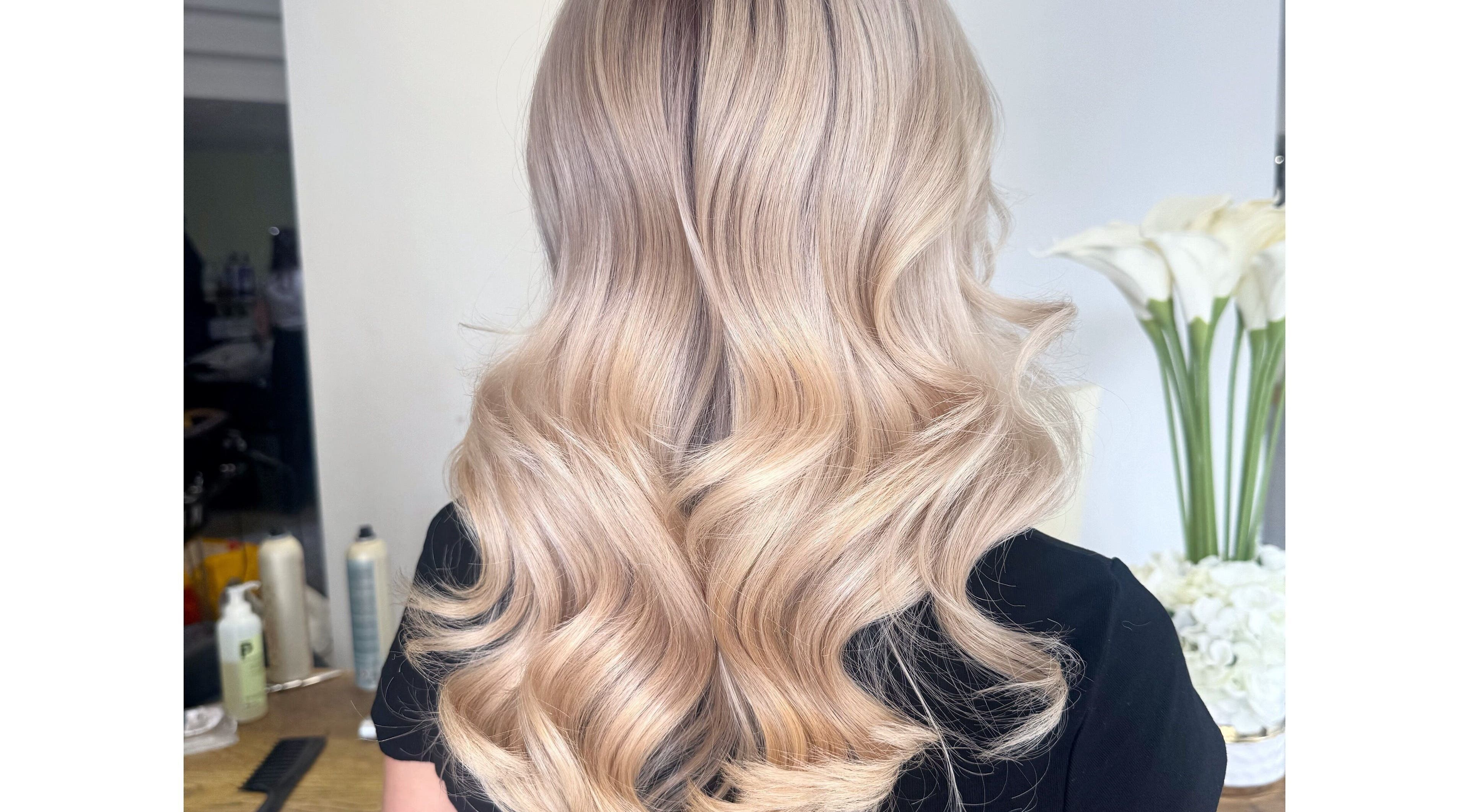 Blonde hair styled in waves at Isabelle Grace Hair, Studio J, Burnley, England, GB.