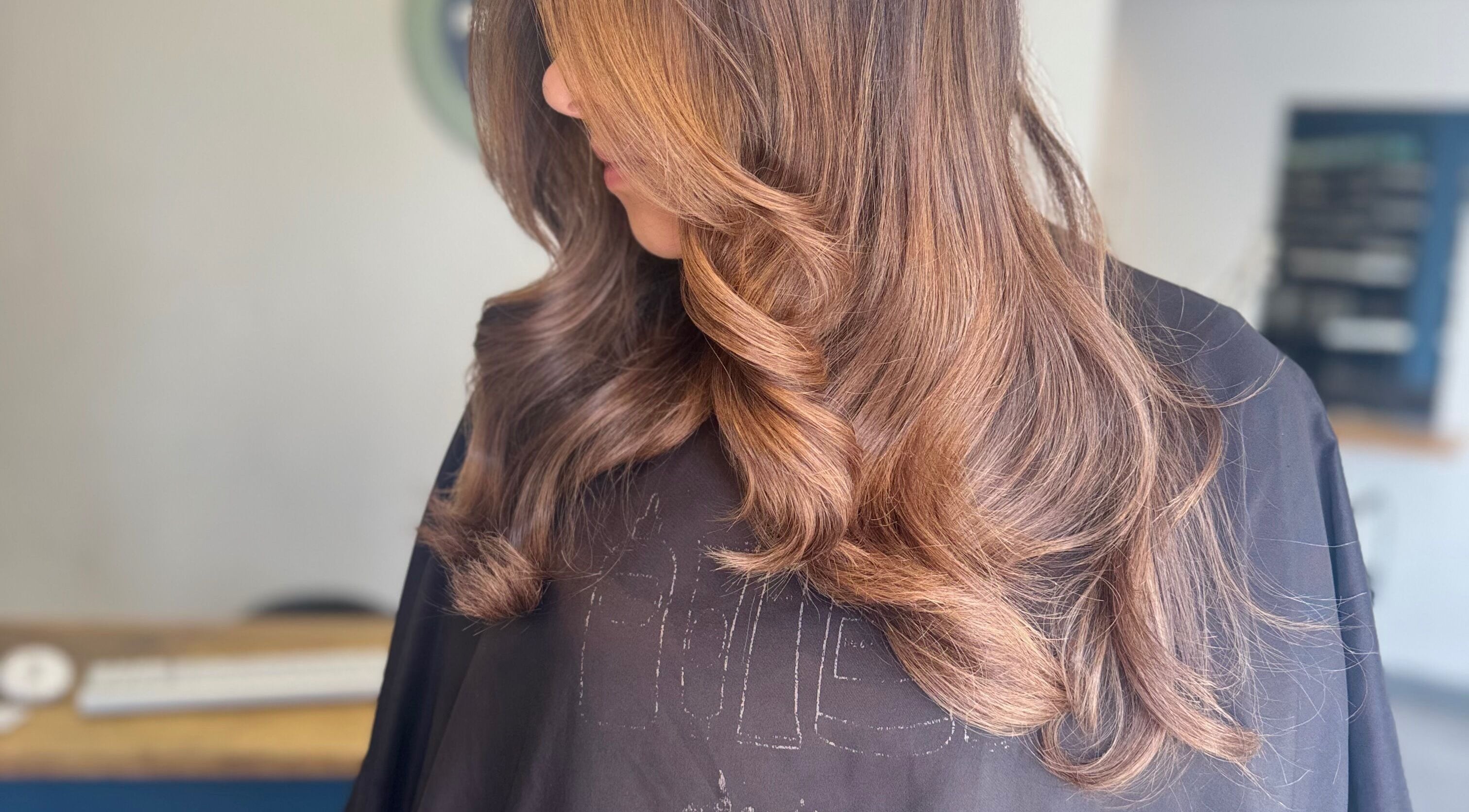 Stylish hair transformation at Isabelle Grace Hair at Studio J, Burnley, England, GB showcasing elegant curls.