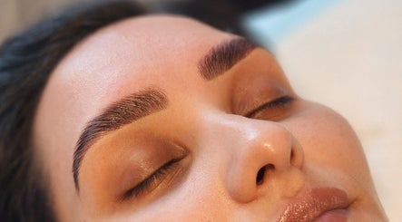 Close-up of a serene face with styled brows at Aurèla Beauty, Austral, New South Wales, AU.