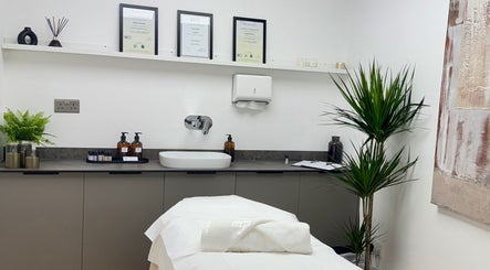 Serene treatment room at Kenna Wellness & Spa, London, England, GB with elegant decor and relaxing ambiance.