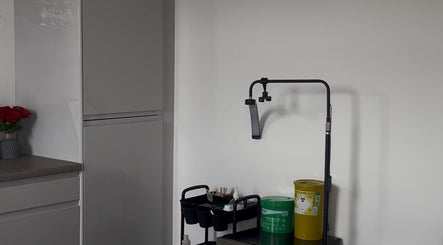 Organized salon workspace at ByMara, Glasgow, Scotland, GB with modern tools and storage.