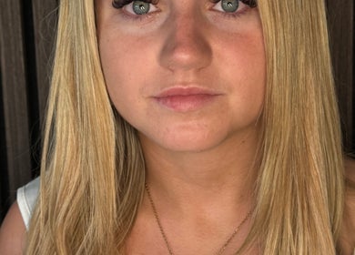 A woman showcases eyelash extensions at Lucy_Lashesx, located in Dublin, County Dublin, IE.