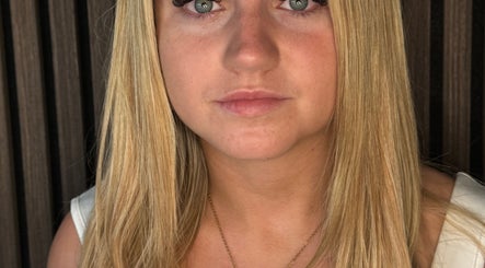 A woman showcases eyelash extensions at Lucy_Lashesx, located in Dublin, County Dublin, IE.