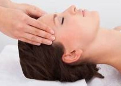 Calming head massage at Incension Body & Massage in Alderley, Queensland, AU promoting relaxation and wellness.