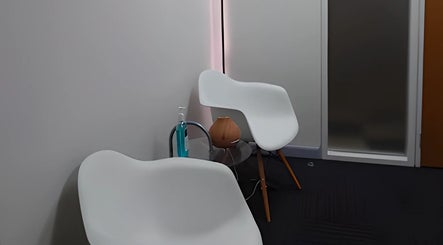 Modern seating at Balancing Wellness, Melbourne, Victoria, AU creates a relaxing atmosphere.