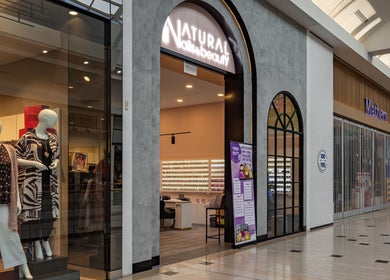 Entrance of Eastland Natural Nails & Beauty in Melbourne, Victoria, AU showcasing chic interior design.