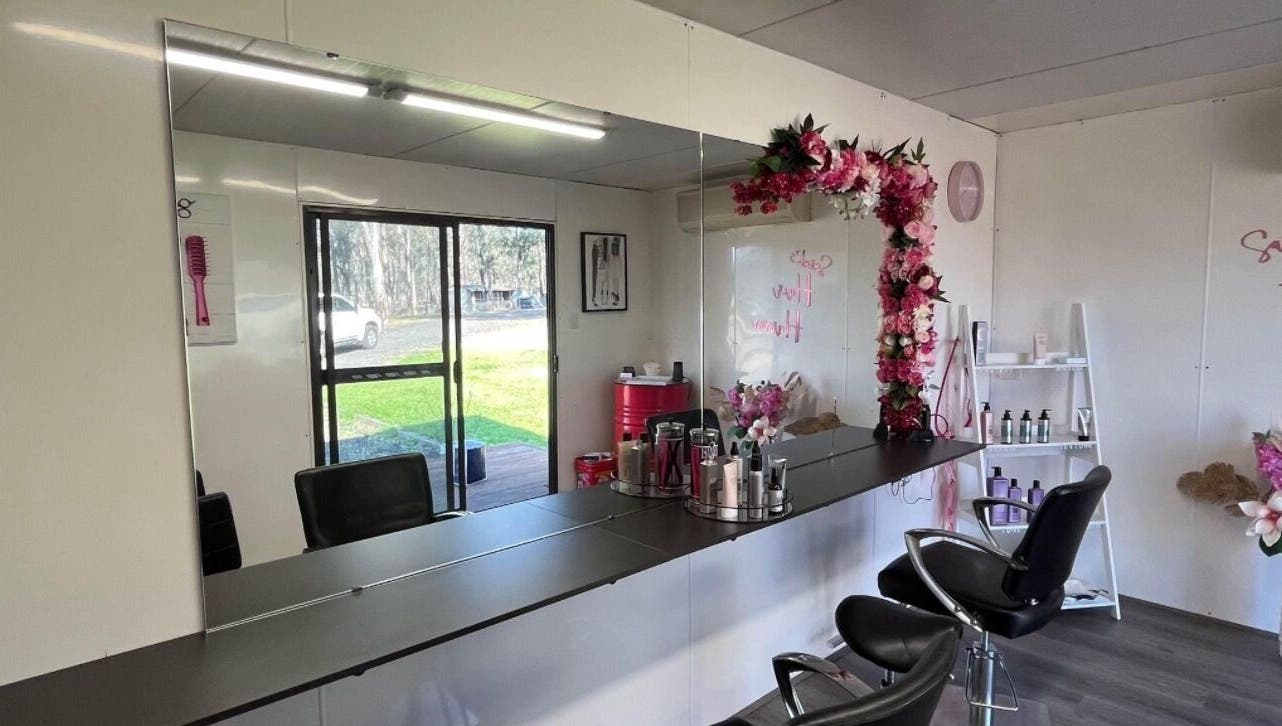 Interior of Shac Studio in Forbes, New South Wales, AU featuring floral decor and salon chairs.