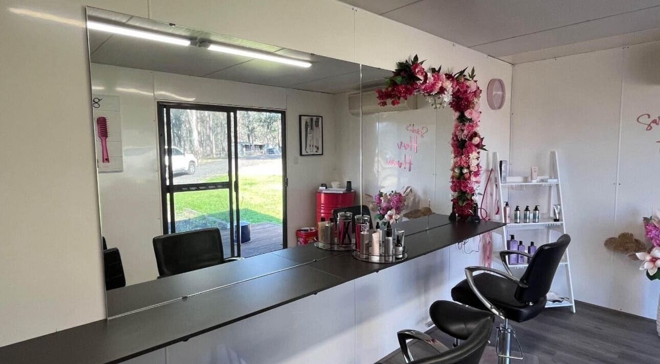 Interior of Shac Studio in Forbes, New South Wales, AU featuring floral decor and salon chairs.