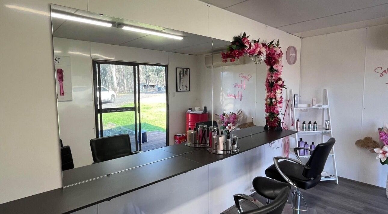 Interior of Shac Studio in Forbes, New South Wales, AU featuring floral decor and salon chairs.