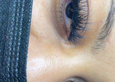 Close-up of eyelash extensions at Seven14, Vallejo, California, US, showcasing detailed lash work.