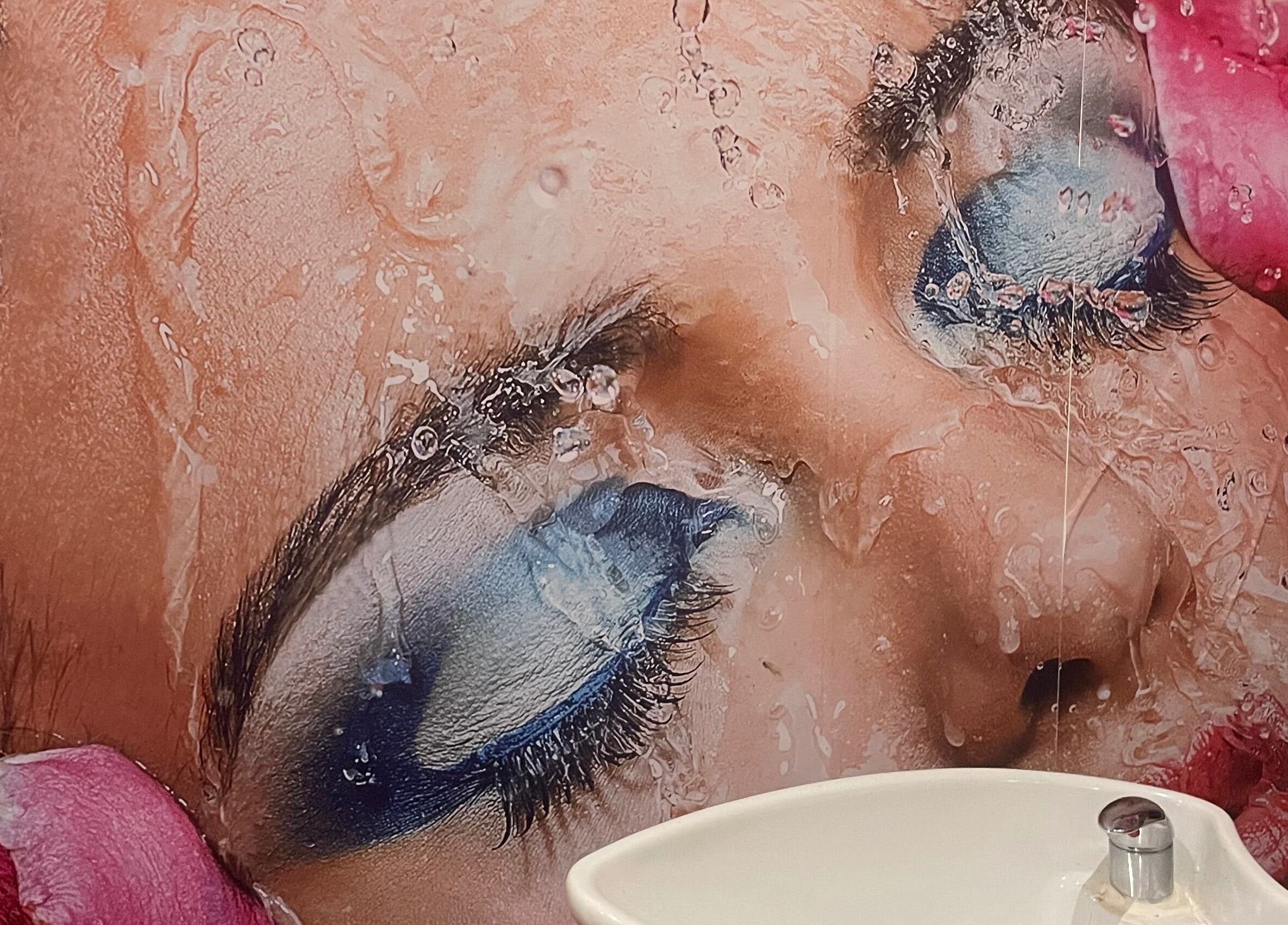 Elegant beauty mural at Sophie Michelle Hair in London, England, GB with a sink in the foreground.