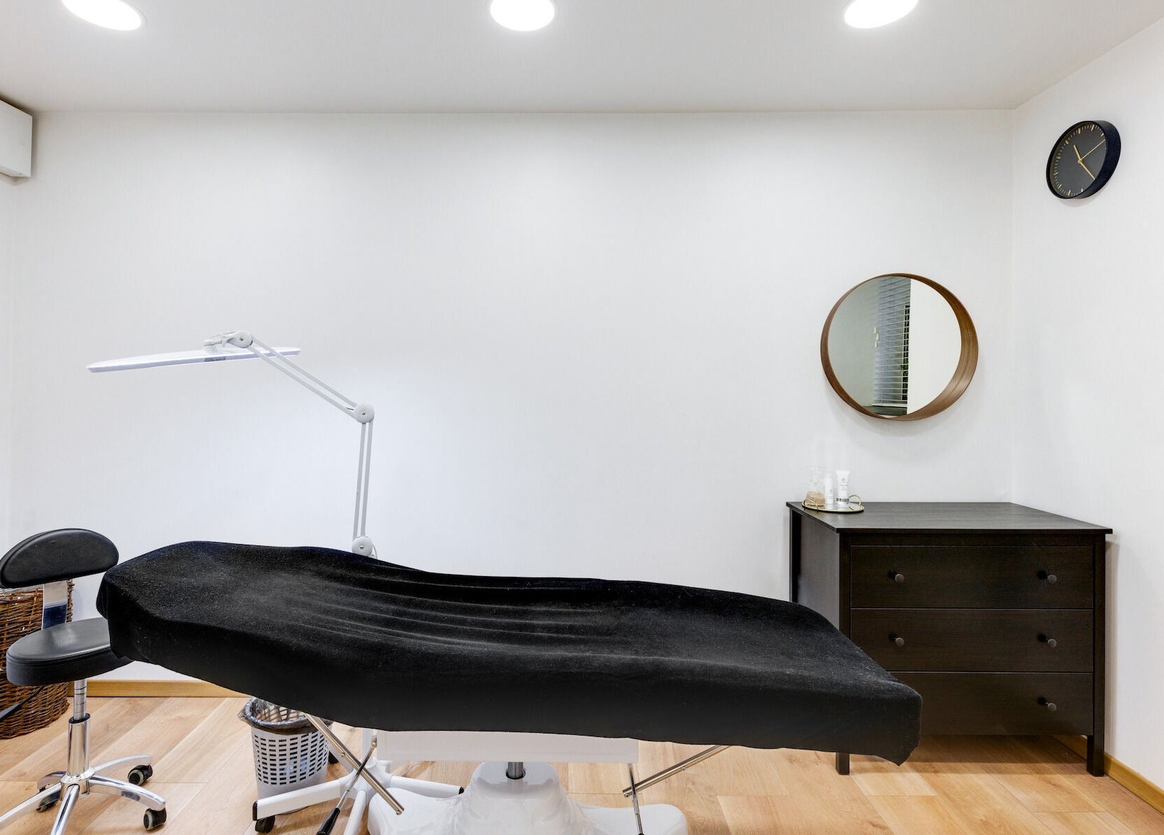 Treatment room at My Lamination Studija, Vilnius, Vilniaus Apskritis, LT with sleek black furnishings.
