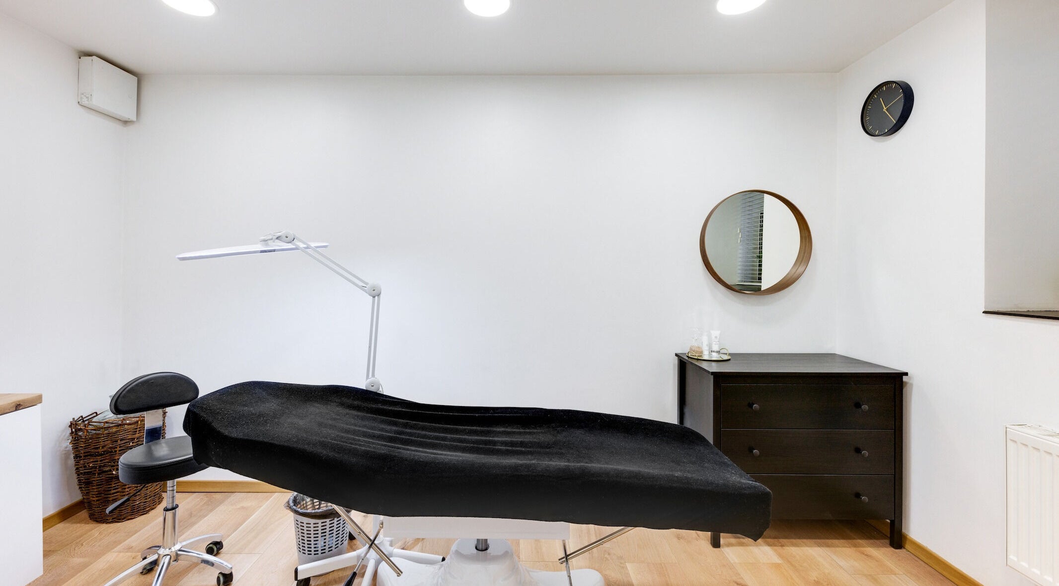 Treatment room at My Lamination Studija, Vilnius, Vilniaus Apskritis, LT with sleek black furnishings.