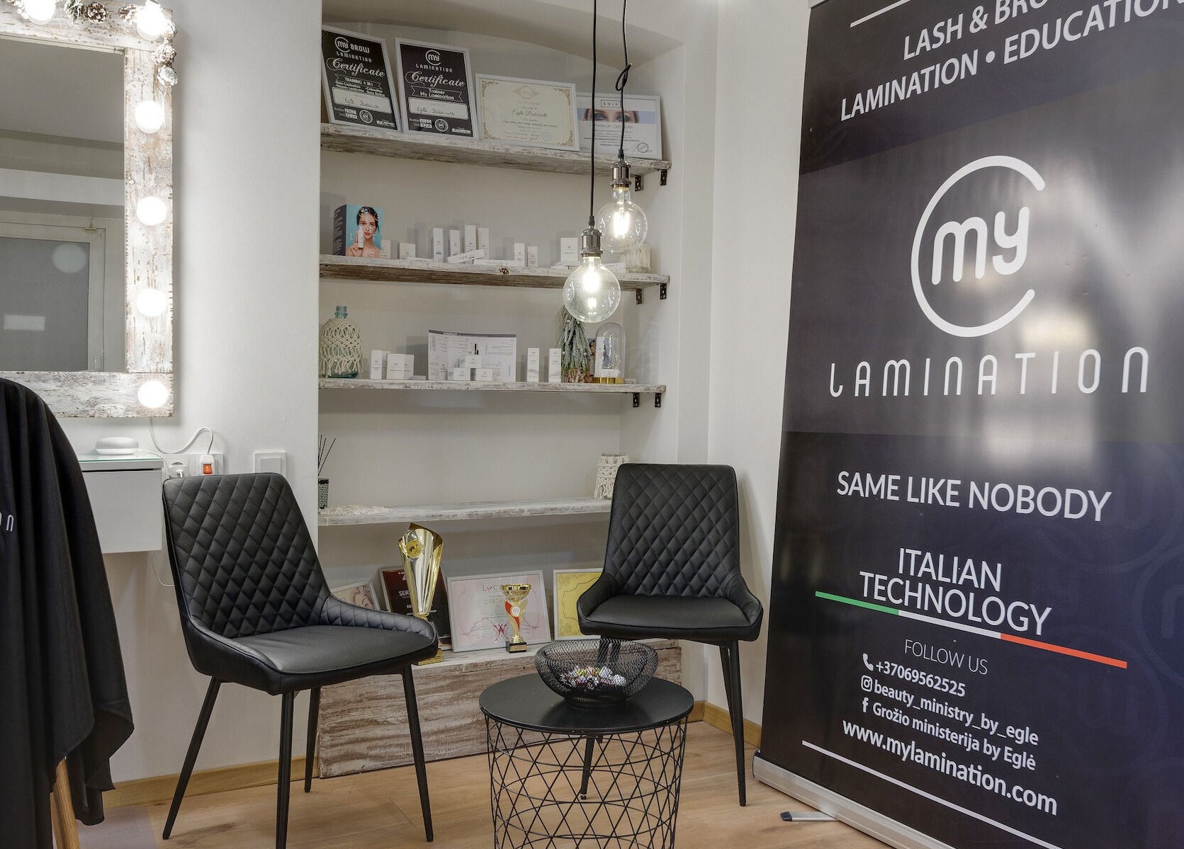 Cozy seating at My Lamination Studija, Vilnius, Vilniaus Apskritis, LT, showcasing stylish decor and beauty products.