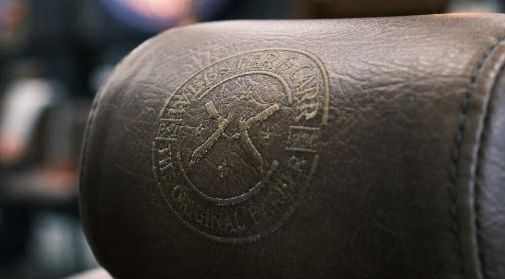 Close-up of Webster & Carr leather emblem in Newcastle upon Tyne, England, GB showcasing fine craftsmanship.