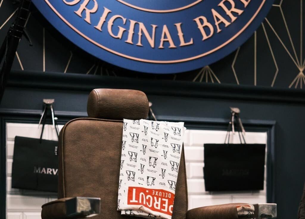 Stylish barber chair at Webster & Carr, Newcastle upon Tyne, England, GB, offering premium grooming services.