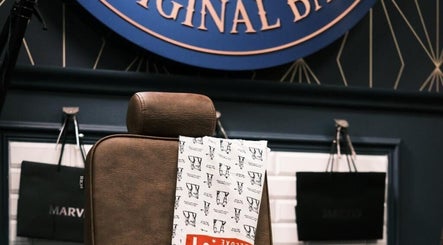 Stylish barber chair at Webster & Carr, Newcastle upon Tyne, England, GB, offering premium grooming services.