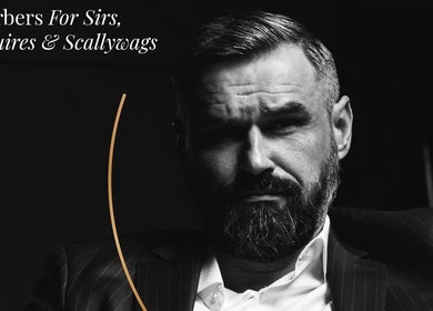 Sophisticated man in suit at Webster & Carr, Newcastle upon Tyne, England, GB. Perfect for modern barbershop vibes.