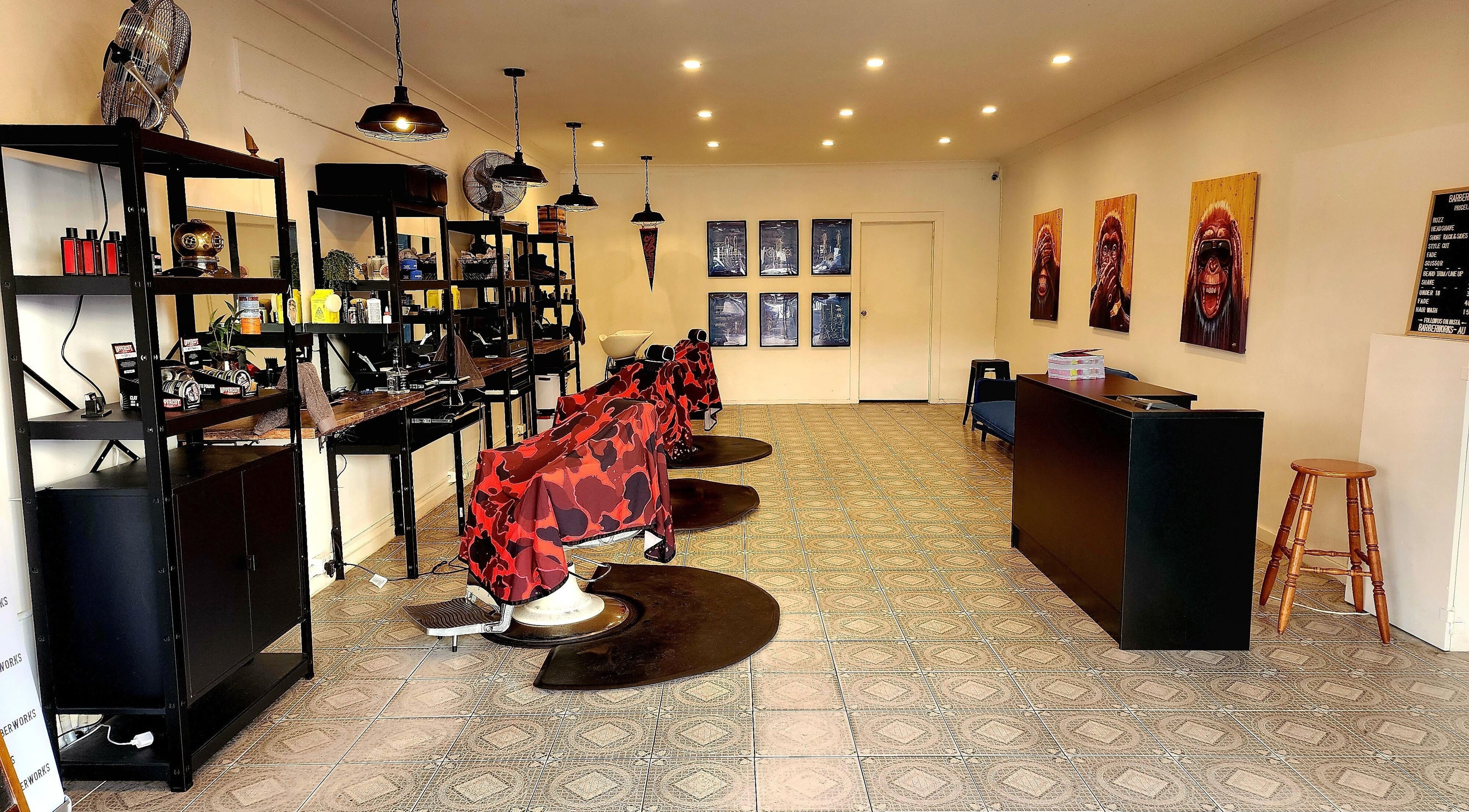 The Barberworks chic interior with vibrant chairs and art, Marrickville, New South Wales, AU.