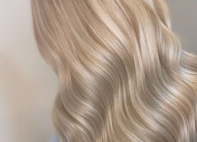 Elegant blonde waves styled at Aurore&Ember, Ryton, England, GB, showcasing luxurious salon results.