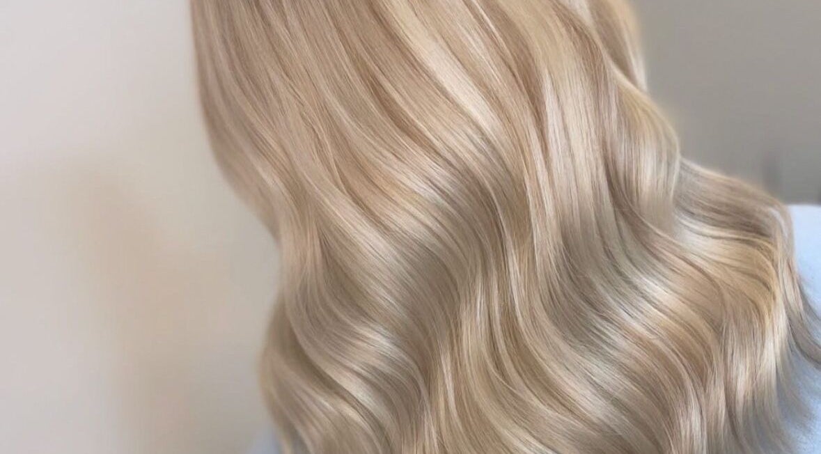 Elegant blonde waves styled at Aurore&Ember, Ryton, England, GB, showcasing luxurious salon results.