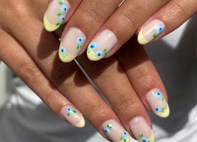Elegant floral nail art at The Nail Babe, Bromley, England, GB showcasing creative designs.