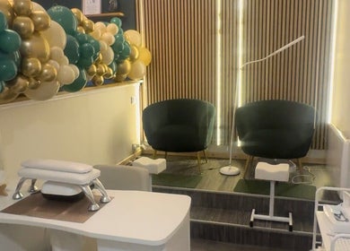 Chic interior of Ily.Eyebrows Artist Pmu And Removal Specialist in Wallsend, England, GB with stylish seating and decor.