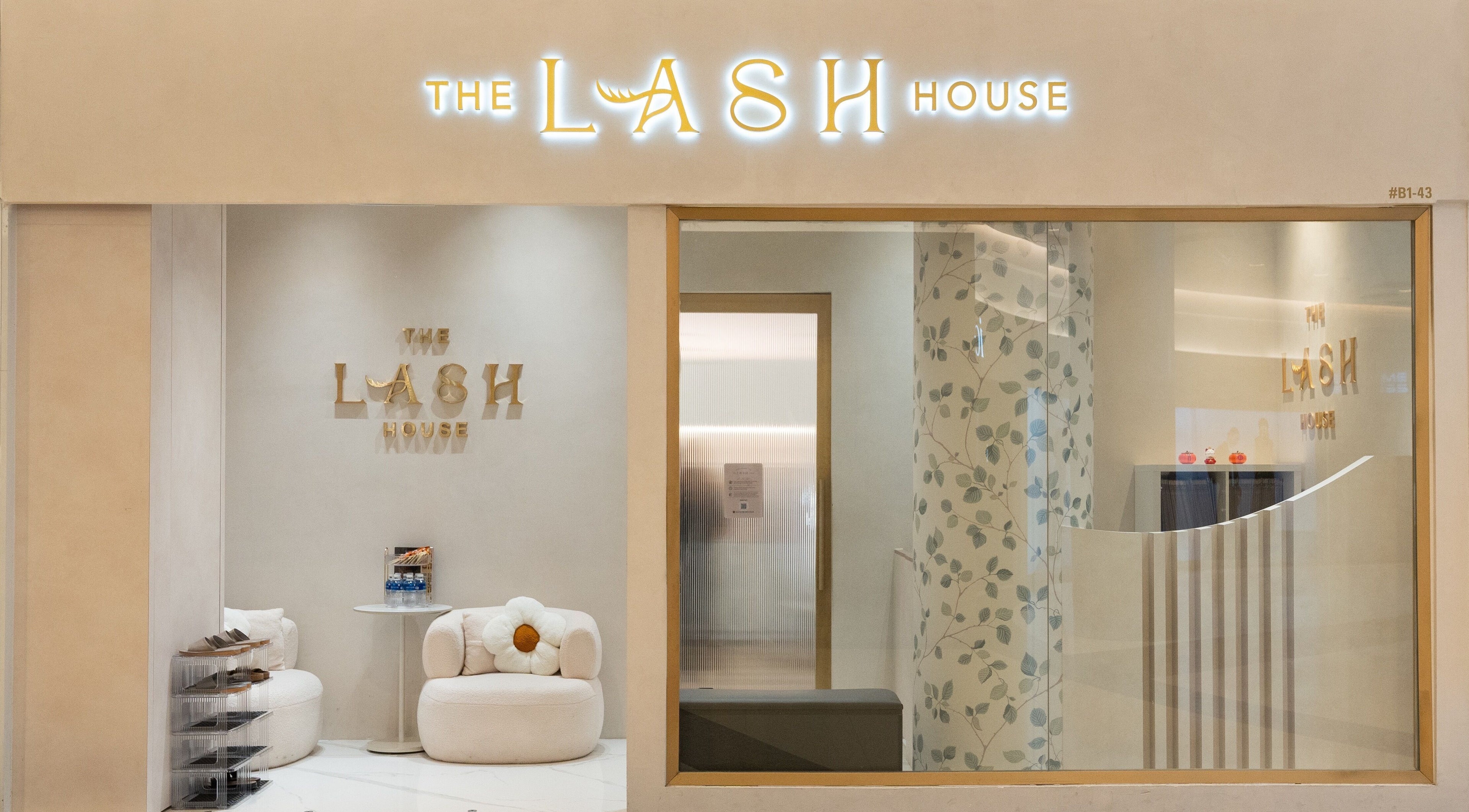 Entrance of The Lash House in Singapore, Singapore, SG with stylish decor and branding.