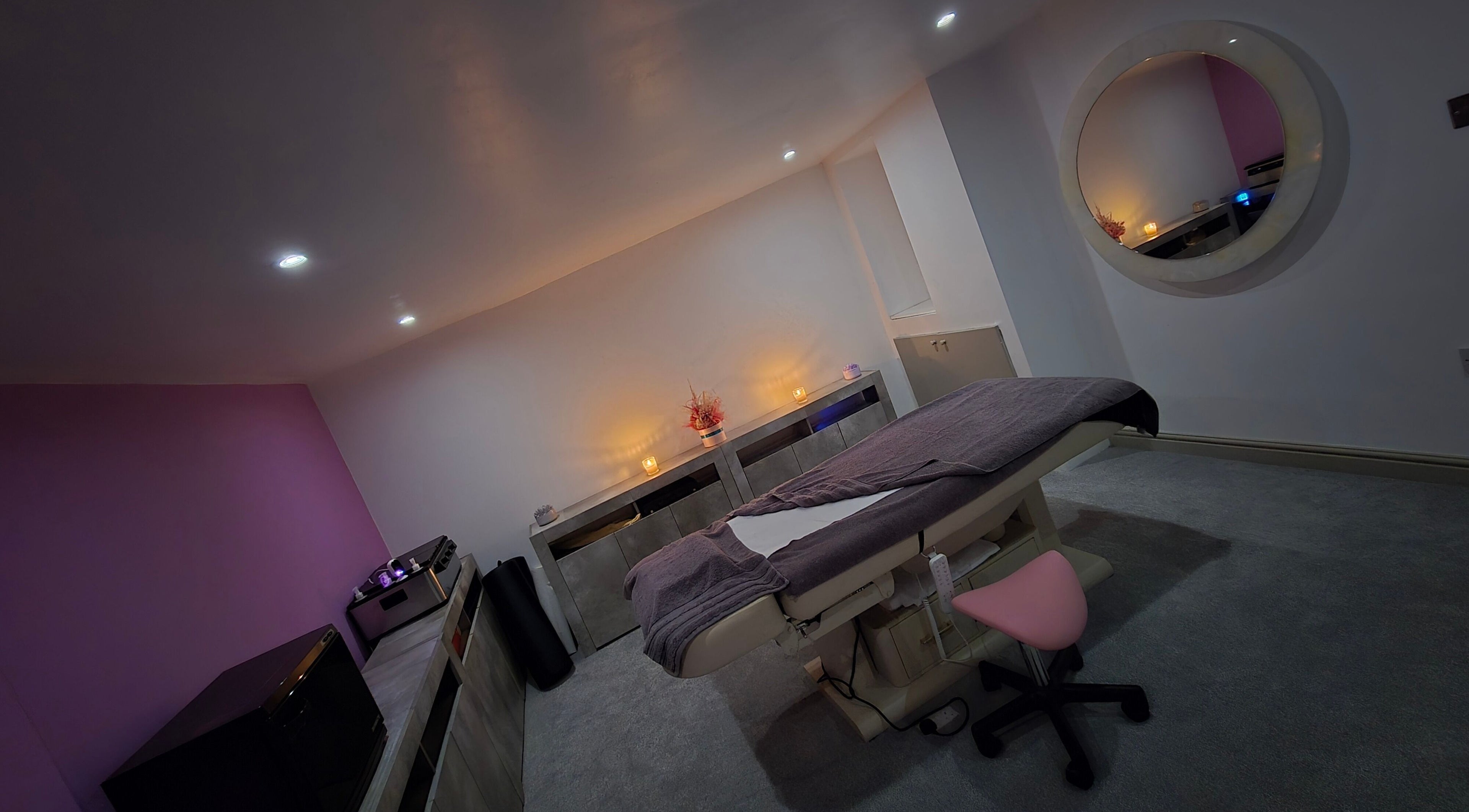 Relaxing massage room at Nj Natural Alignment, Liverpool, England, GB, with soft lighting and a cozy atmosphere.