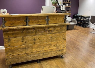 Jesse Jackson Hair salon front desk with rustic wood in Cudworth, England, GB.