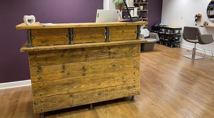 Jesse Jackson Hair salon front desk with rustic wood in Cudworth, England, GB.