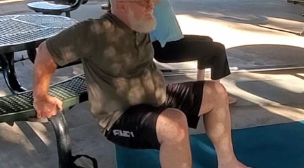 Outdoor exercise session at Active Healing Dallas FT Worth, Watauga, Texas, US, featuring bench dips.