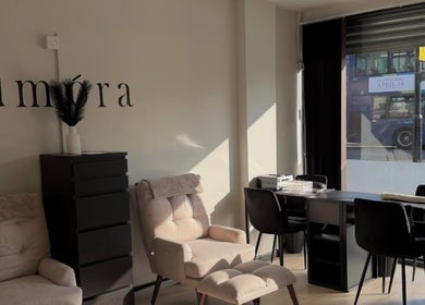 Relaxing seating area at Gigi's Skin Lab inside Lumóra, Sheffield, England, GB, with chic decor.