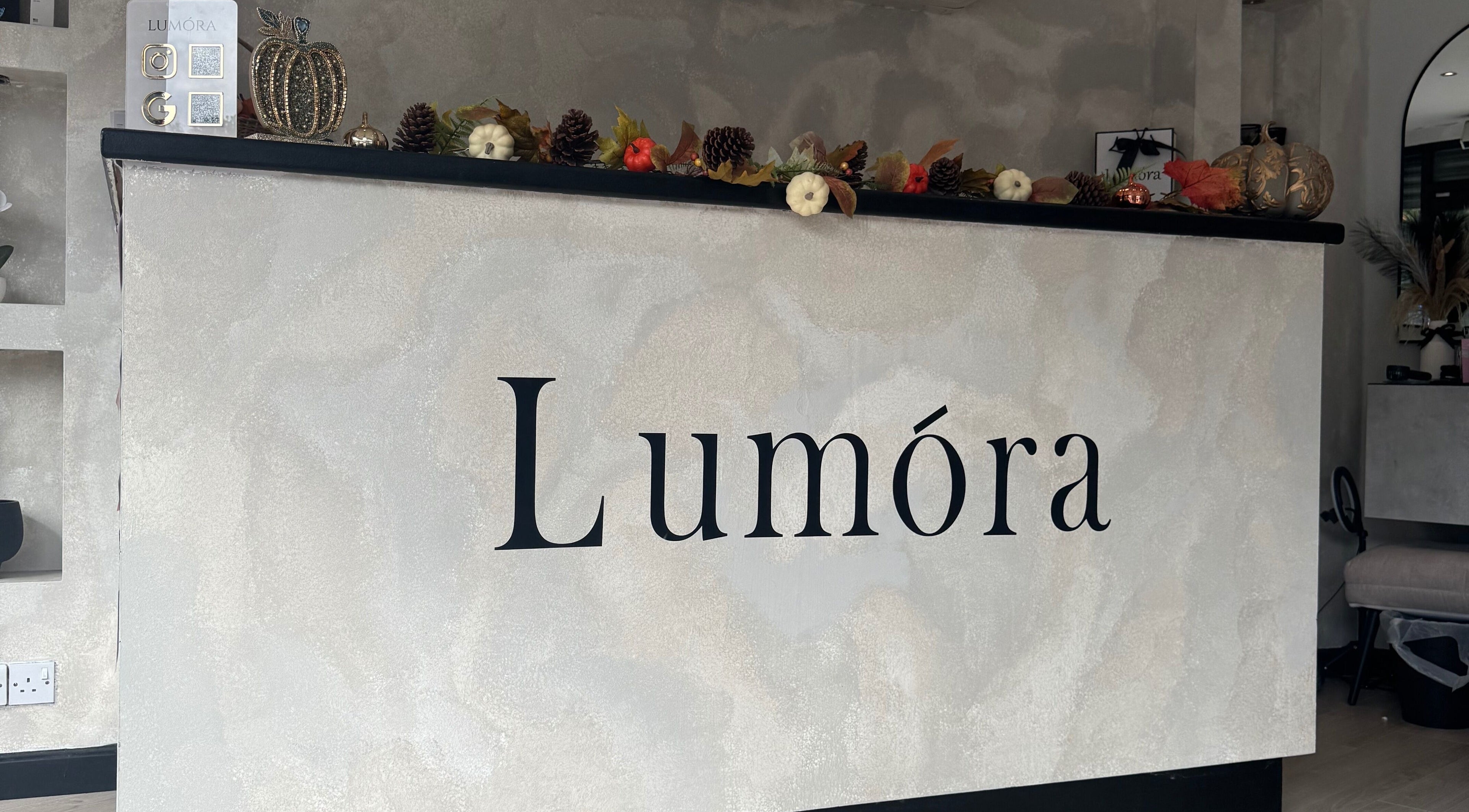 Reception area at Gigi's Skin Lab (inside Lumóra) in Sheffield, England showcasing elegant decor.