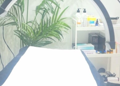 Serene treatment room at Gigi's Skin Lab (inside Lumóra), Sheffield, England, GB with cozy decor and skincare products.
