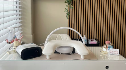 Modern nail station at Nailz by Amber Mia, Exeter, England, GB showcasing manicure tools and decor.