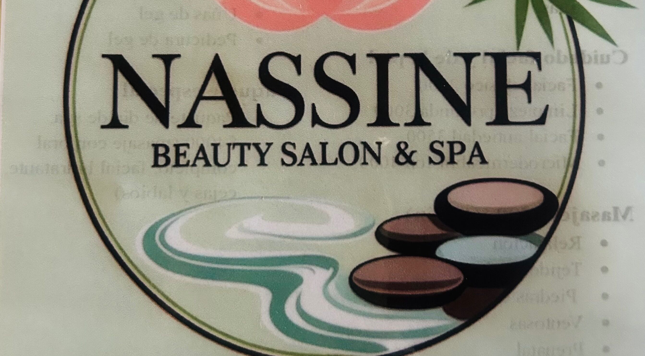 NASSINE Beauty Salon & Spa logo featuring calming stones and waves, located in Jarabacoa, La Vega, DO.
