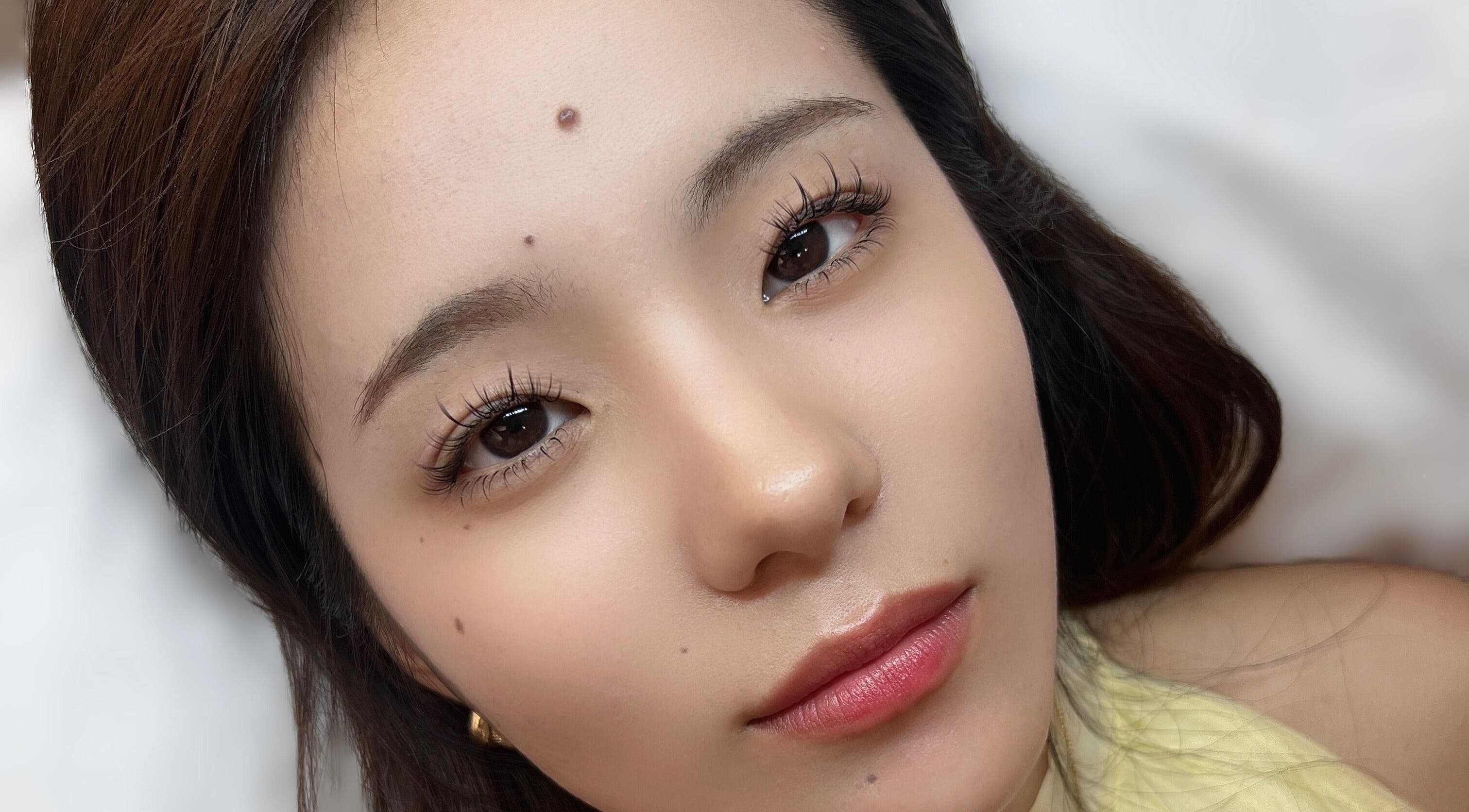 Close-up of a woman's face showcasing natural beauty at S.G.L Studio, Toronto, Ontario, CA.